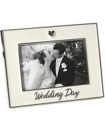 Celebrate the excitement of saying "yes" with this elegant Caroline Collection wedding frame. Featuring a simple heart accent and the sentiment "Wedding Day," this timeless design provides a beautiful way to display a cherished photo from the beginning of